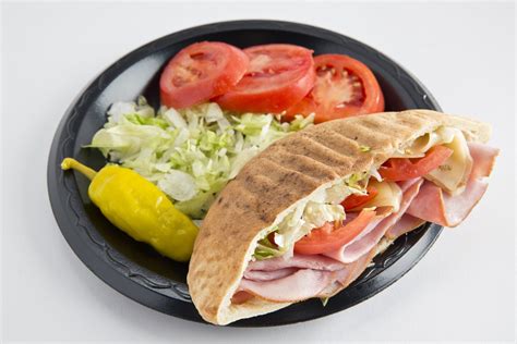 Pita delite - Pita Delite Menu. Main Menu. $3.99 Delite Menu. Delite Mini Salad. lettuce, tomato and feta cheese, topped with your choice of steak, chicken or homemade chicken, tuna or crab salad. served with half a pita pocket. Delite Cool Subs.